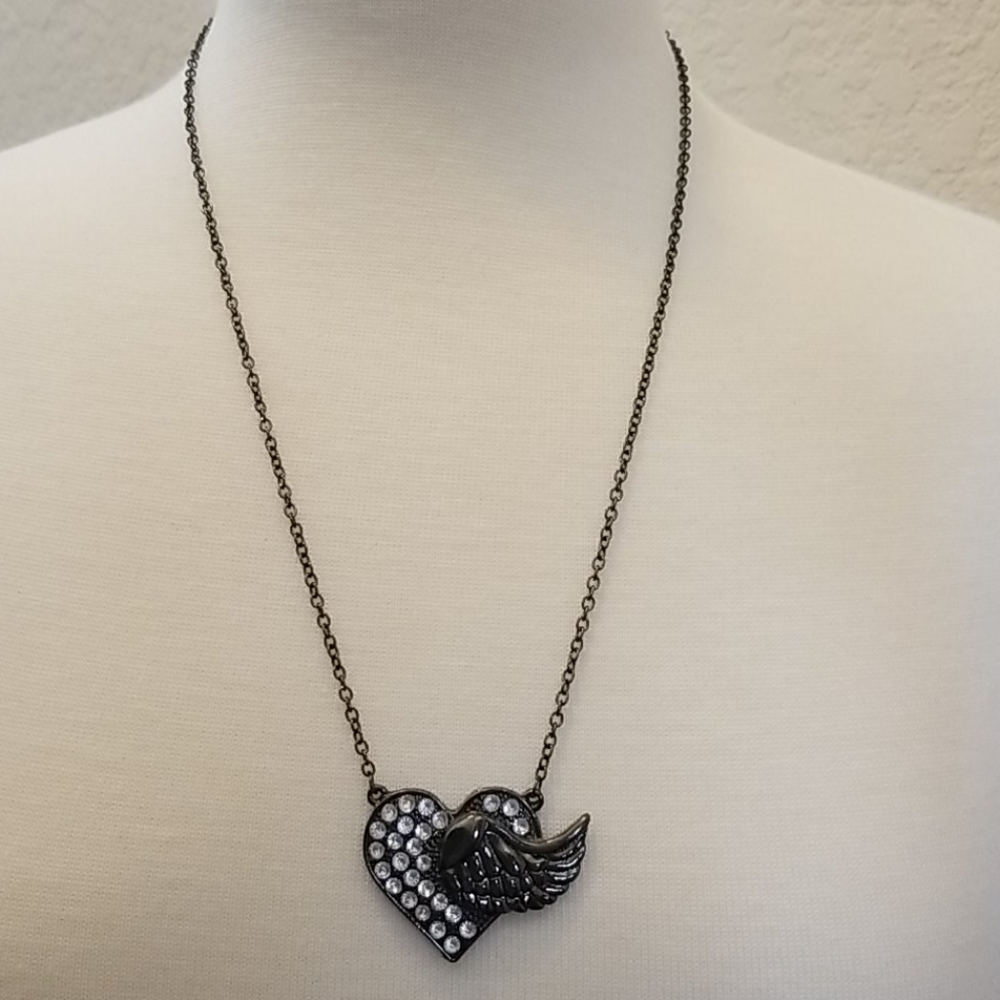 Heart and wing necklace.